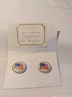 Front view showing both Lenox flag pins on original card