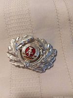 Front view showing full oak leaf wreath and enamel centre