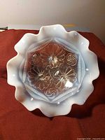 Top view showing ruffled opalescent rim and interior pattern