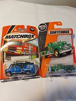 Front view of both sealed Matchbox vehicles on cards