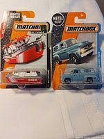 Front view showing both sealed Matchbox vehicles on cards