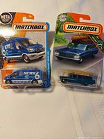 Both sealed Matchbox vehicles side by side