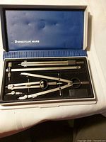 Open Staedtler Mars case showing full set of compasses and accessories
