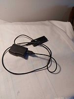 Android TV stick and power adapter with cable