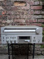 Front view of Akai amplifier and tuner stacked