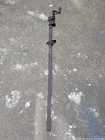 Full view of 5-foot metal clamp laid flat