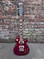 Full front view showing entire Epiphone Les Paul guitar