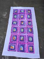 Full view of quilt laid flat showing overall design and dimensions