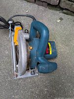 Left side view showing overall saw and power cord