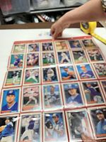 Overview of multiple sleeved pages of Topps baseball cards