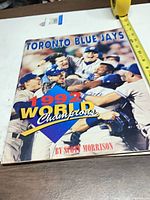 Front cover showing title and celebratory photo