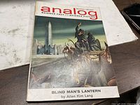 Front cover showing title, artwork, and lead story credit