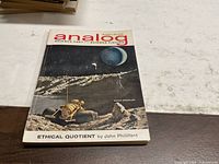 Front cover showing title, date, artwork of moon crawler