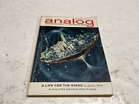 Front cover showing title, date, artwork, feature story