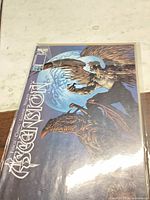 Front cover showing Ascension #1 in bag with board