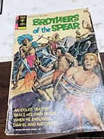 Front cover showing title, artwork, publisher logo and visible wear