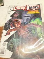 Front cover of Checkmate #1 in polybag