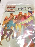 Front view of bagged Classics Illustrated Junior Brightboots No. 574 comic showing artwork and characters