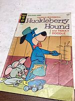 Front cover showing title, characters, Gold Key logo and visible rip