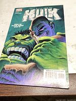 Front cover of Hulk #59 comic showing title, artwork, Marvel logo, Direct Edition barcode