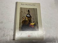 Front cover showing title, image, spiral binding