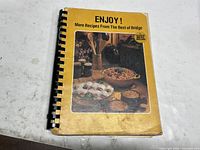 Front cover showing title, subtitle and photo of dishes