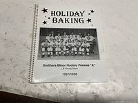 Front cover showing title, team photo, season 1997/1998