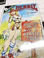 Front cover of Debbie Does Dallas #18 comic in bag