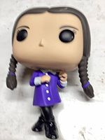 Front view of Wednesday Addams Funko Pop figure