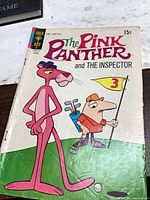 Front cover showing Pink Panther, Inspector, 15¢ price, spine wear visible