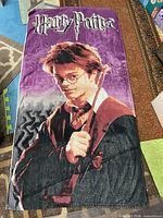 Full view of Harry Potter graphic towel laid flat