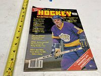 Front cover of March 1979 Hockey Illustrated magazine with measuring tape for scale
