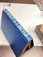 Book spine showing title and blue cover