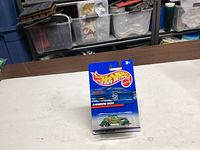 Front view of unopened Hot Wheels 3-Window ’34 die-cast car in original packaging