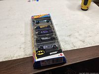 Front of sealed Hot Wheels Batman 5-pack showing five die-cast cars in blister