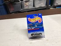 Front view of sealed Hot Wheels Vette 1983 on blue card