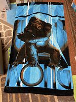 Full view of King Kong graphic towel laid flat