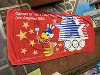 Front view of full towel showing graphics and text