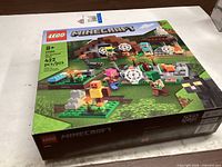 Front of LEGO Minecraft 21190 box showing set details
