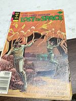 Front cover of comic showing title, artwork, Gold Key logo, 30¢ price