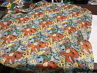 Full view of the Pokémon infinity scarf showing character pattern