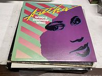 Front cover of Aretha Franklin "Who’s Zoomin’ Who" 12" vinyl
