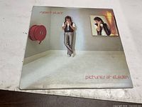Front cover of Robert Plant Pictures At Eleven LP