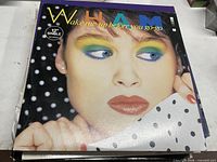 Front of Wham! Wake Me Up Before You Go-Go 12" single sleeve