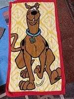 Full view of Scooby-Doo towel showing design and borders