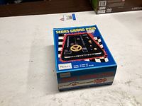 Box top showing Sears Grand Prix branding and artwork
