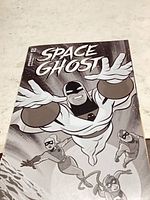 Front cover showing title, issue number 02, grayscale artwork