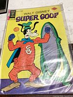 Front cover of Super Goof comic in bag with backing board