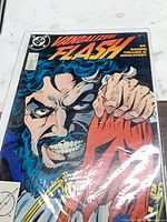 Front cover of The Flash #14 in protective sleeve