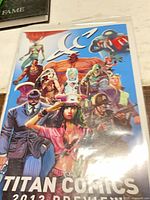 Front cover of the Titan Comics 2013 preview comic in bag and board